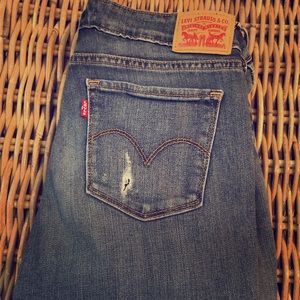 Levi’s destroyed dark blue jeans